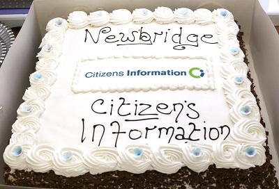 Celebrating the opening with a special cake.